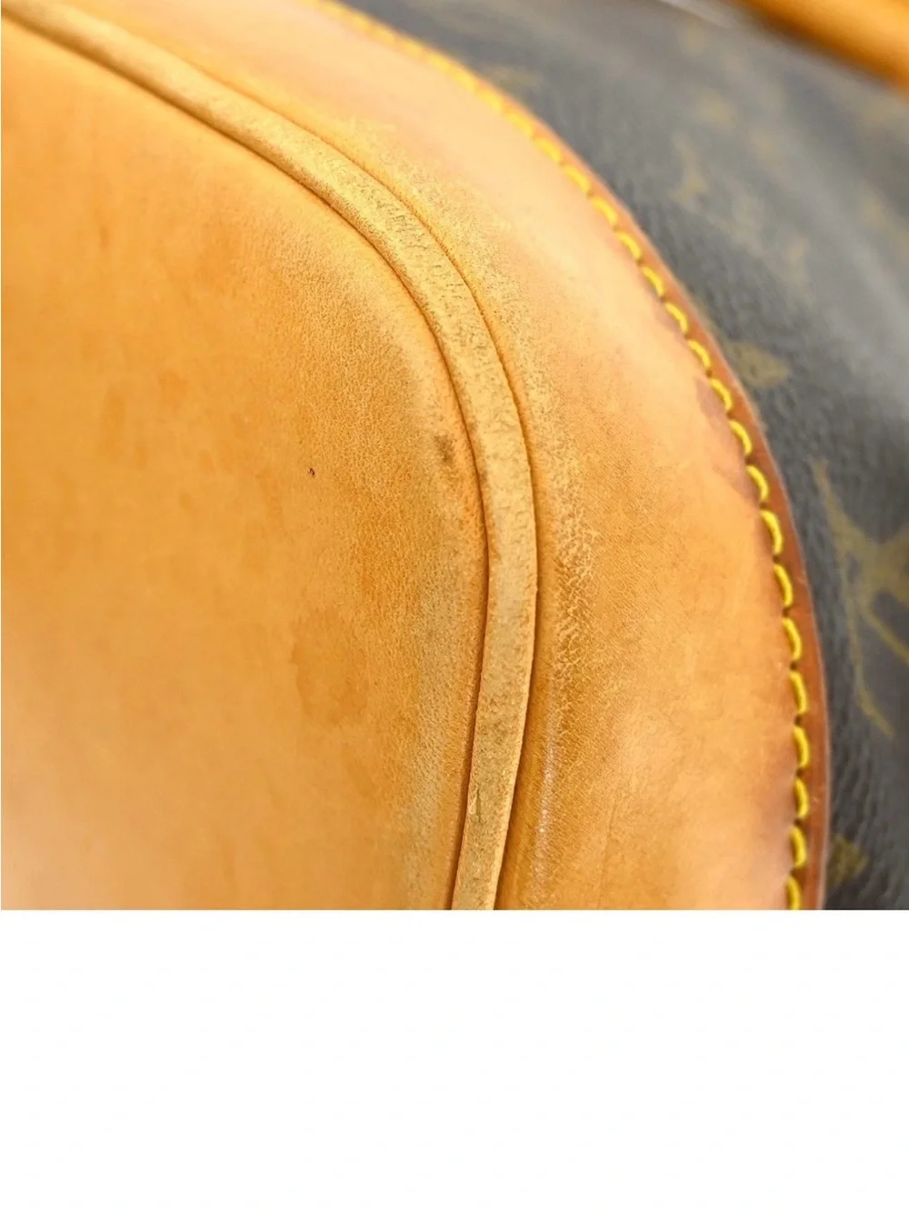 Louis Vuitton Monogram Alma handbag.